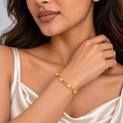 Kavya Heart Station Bracelet — angled model view