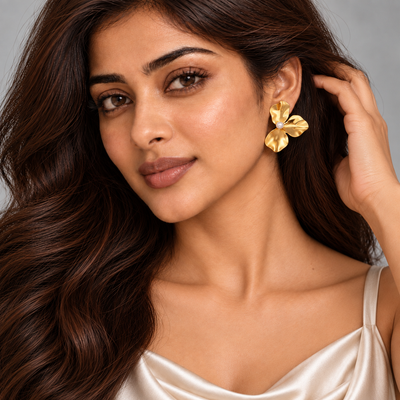 Lila Sculpted Petal Earrings — angled model close-up