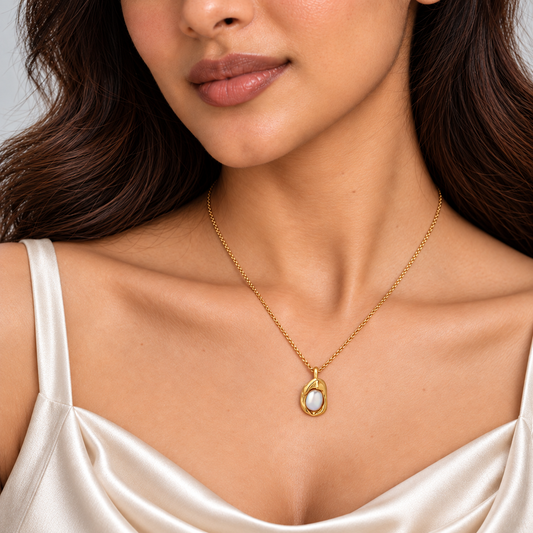 BRIHA sculptural oval pearl pendant necklace front model close-up