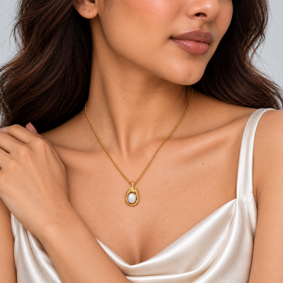 BRIHA sculptural oval pearl pendant necklace angled model close-up